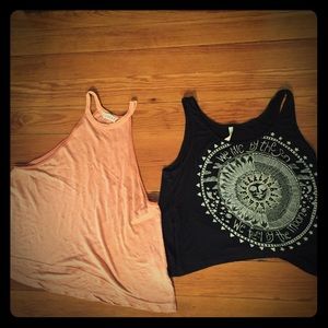 Two cropped tank tops